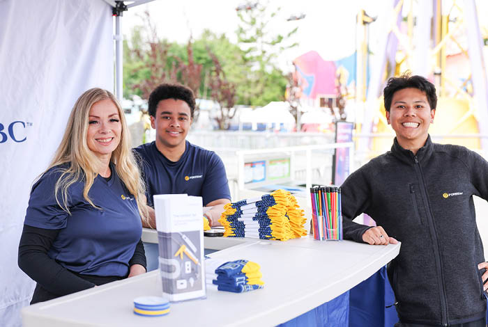 25-090-2-corpposw3-web-landingpage-images-press-1 FortisBC street team members, Michelle Dixon, Justin Dixon and Jonathan Calvez, supporting The Happy Campers Fund. It provides grants for children to attend specialized summer camps throughout B.C., giving them the chance to build memories in an environment catered to them.