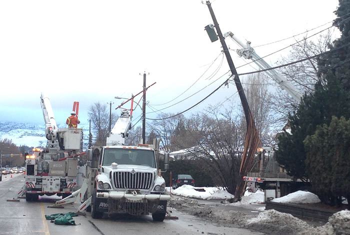 25-090-2-corpposw3-web-landingpage-images-press-2 FortisBC crew repairing a fallen power line pole due to a storm in Kelowna.