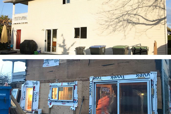 Before and after photo of the back of the house. The before photo is prior to demolition. The after photo show the new laundry room door and kitchen window replacing the small slider and old kitchen window, as well as the new 11-foot slider off the new dining room.