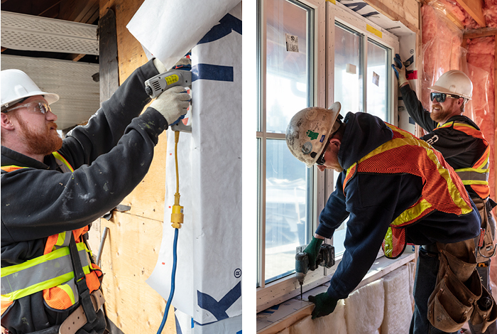 The crew installer securing the house wrap around the rough window opening.