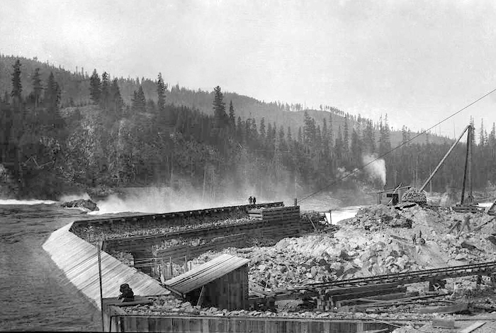 The building phase of powerlines throughout the Kootenay River.