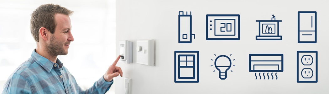 Man adjusts thermostat on wall. Icons include a water heater, thermostat, fireplace, fridge, window, lightbulb, air conditioner, electrical wall outlet