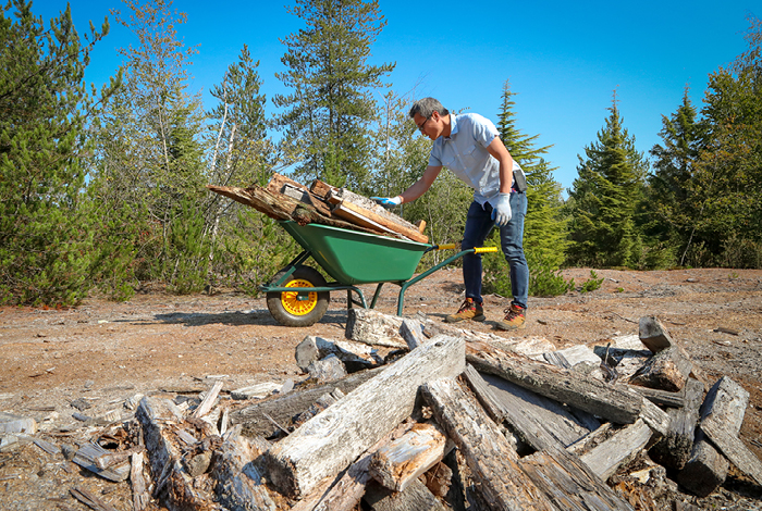 Cleaning up debris at Derby Reach park in Langley