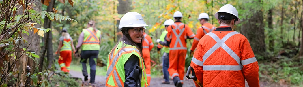 FortisBC employees and community members working together on various environmental projects, showcasing their commitment to eco-stewardship and community engagement.