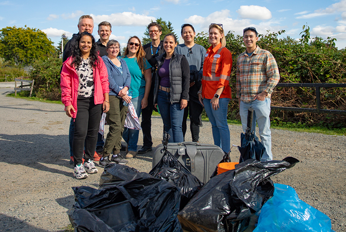 The BC Rivers Day volunteers proudly displaying the litter they collected from the shores of the Nicomekl River and the Brydon Lagoon