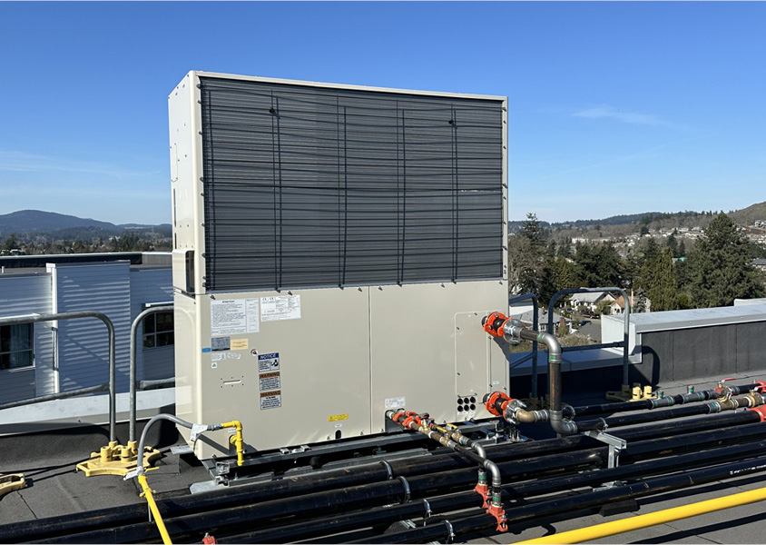 A commercial heat pump on a rooftop.