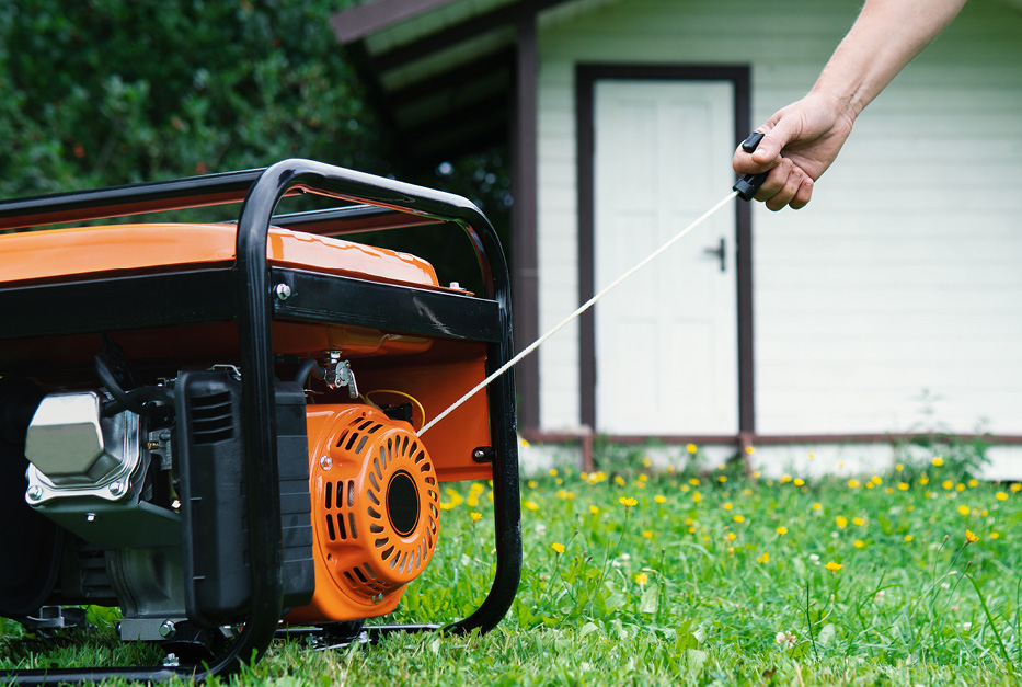 26-064-3-backup-power-blog-inline-c-press A portable generator being started up manually.