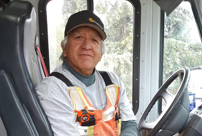 Tom Charlie, crew leader, sits in his work vehicle and recommends attending cultural events like Pow wows, and offers a number of virtual experiences. 
