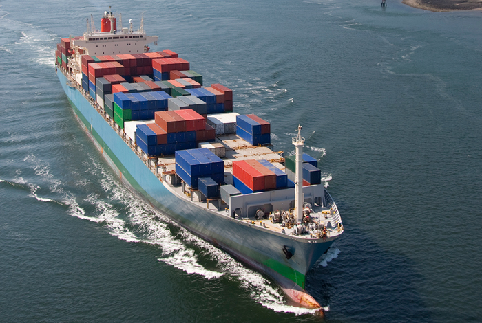 Cargo container ship in the water.