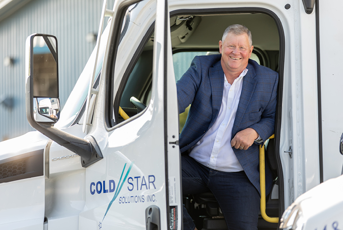 Man sitting in a Cold Star truck.