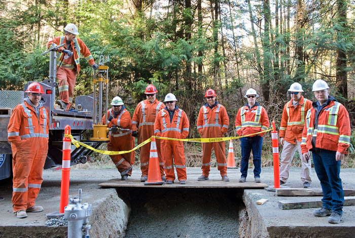 Crew of workers standing