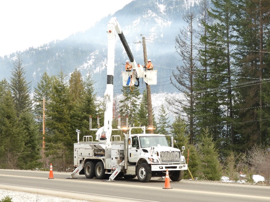 FortisBC power line technicians fix power lines following a winter storm in the Kootenays.