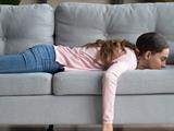 Person laying on a couch