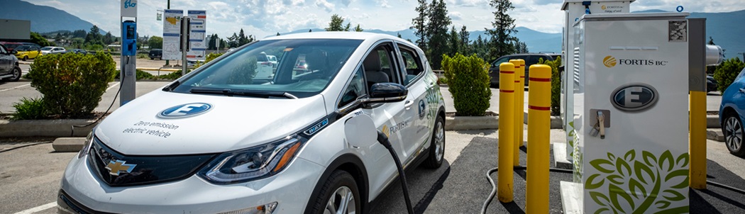 Electric vehicle being charged