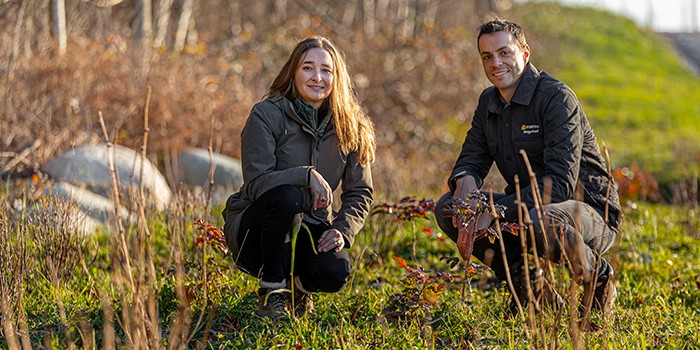 Two of our employees, Melissa Graham, environmental specialist (left) and Alex Munro, corporate communications advisor (right), were part of the team who helped bring this pollinator garden to life. (20-015.2)